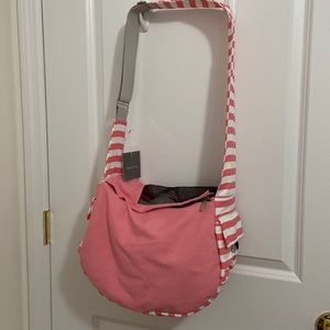 NEW and UNUSED soft pet sling bag by DOGO in pink/white